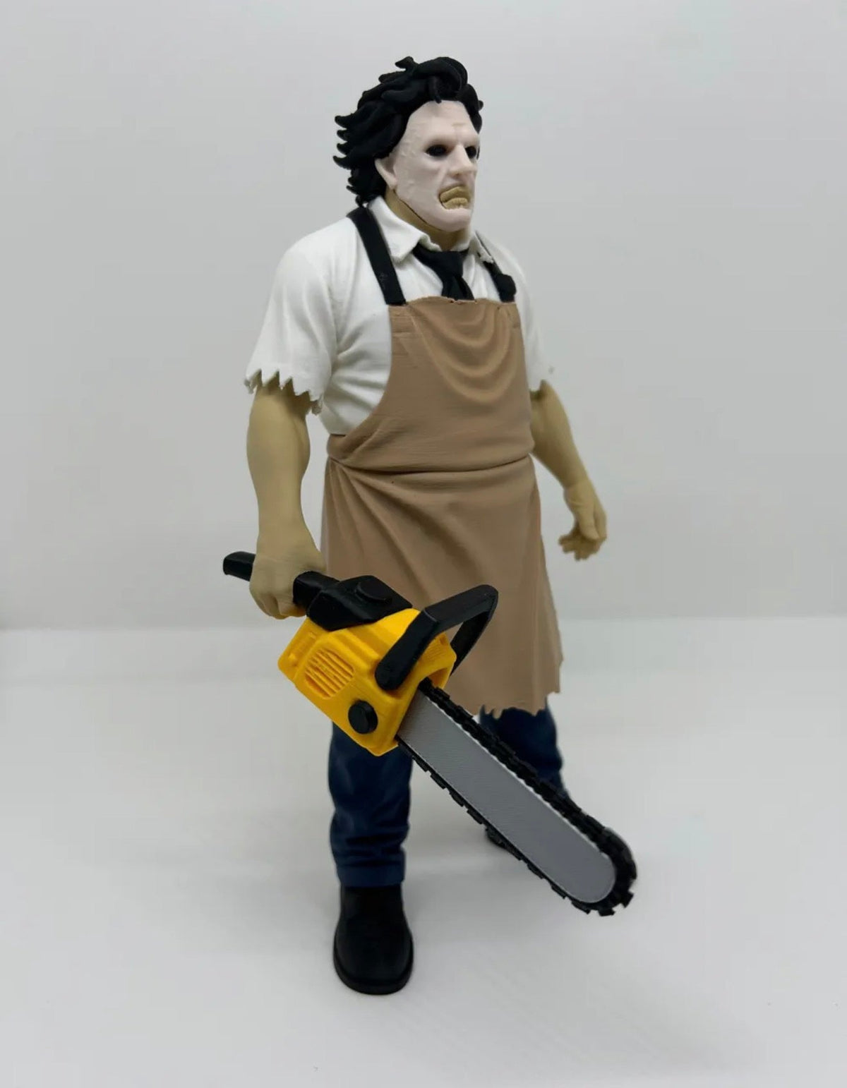 Chainsaw Butcher – Horror Collectible Figure, 8" Tall
